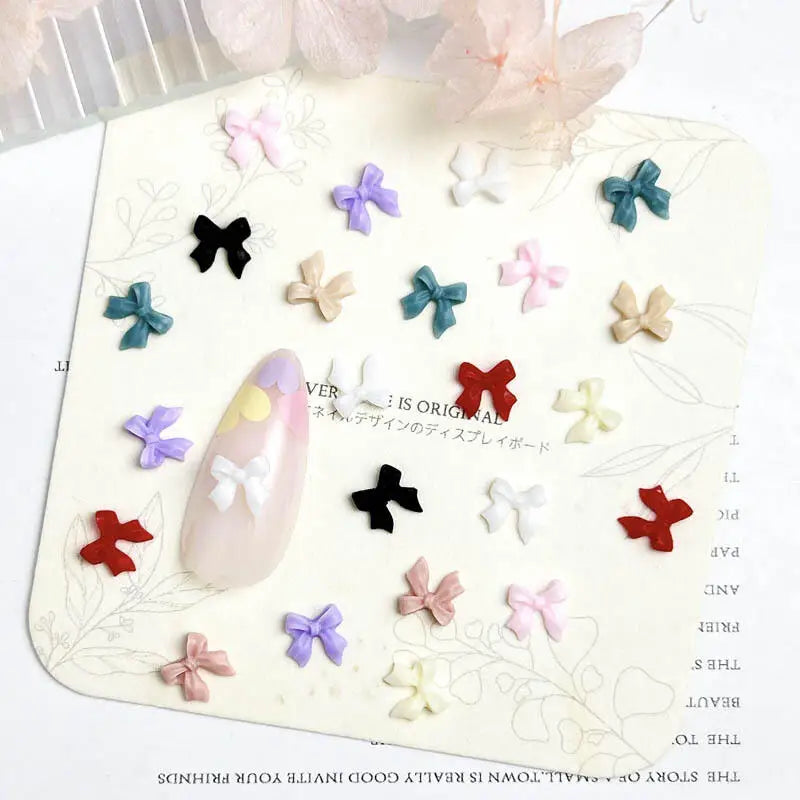 LuxuryGlow 50Pcs 3D Resin Bowknots Nail Art Decorations – Mini Acrylic Ribbon Charms for DIY Nails