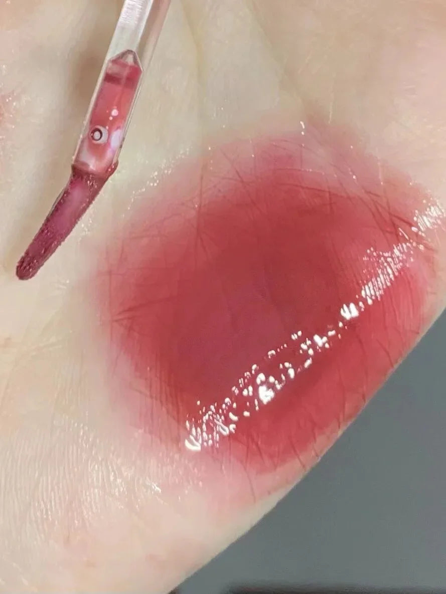 Brillo de labios con efecto espejo en rosa cereza LuxuryGlow: aceite labial hidratante con brillo de cristal