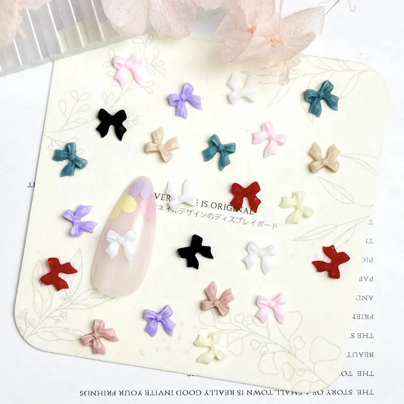 LuxuryGlow 50Pcs 3D Resin Bowknots Nail Art Decorations – Mini Acrylic Ribbon Charms for DIY Nails