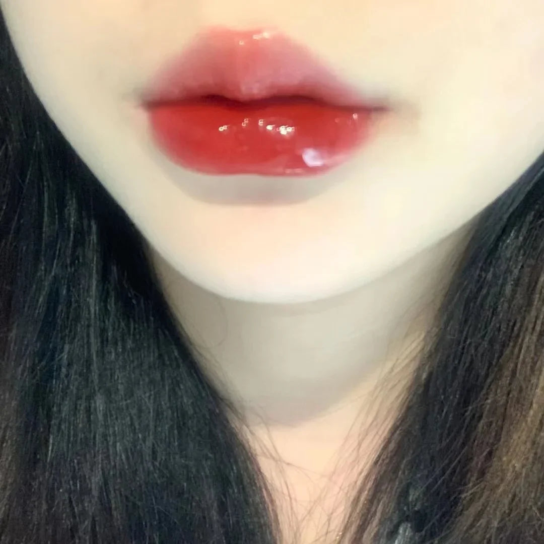Brillo de labios con efecto espejo en rosa cereza LuxuryGlow: aceite labial hidratante con brillo de cristal
