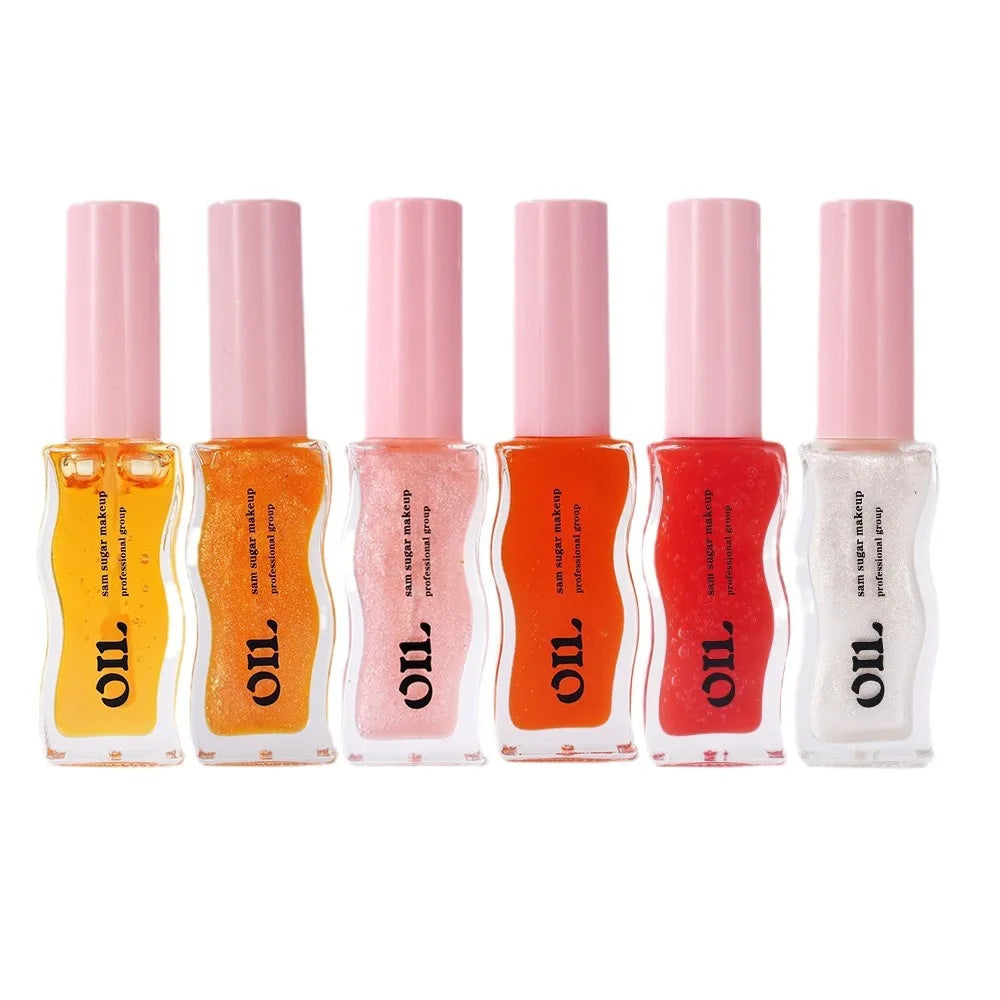 Aceite labial LuxuryGlow Fruit Honey: brillo labial con color, hidratante, voluminizador y resistente al agua.