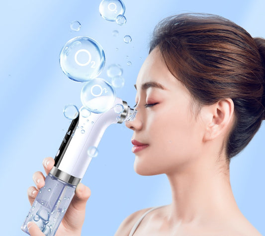 Aspiradora recargable LuxuryGlow para eliminar puntos negros: 5 niveles de succión y 6 sondas
