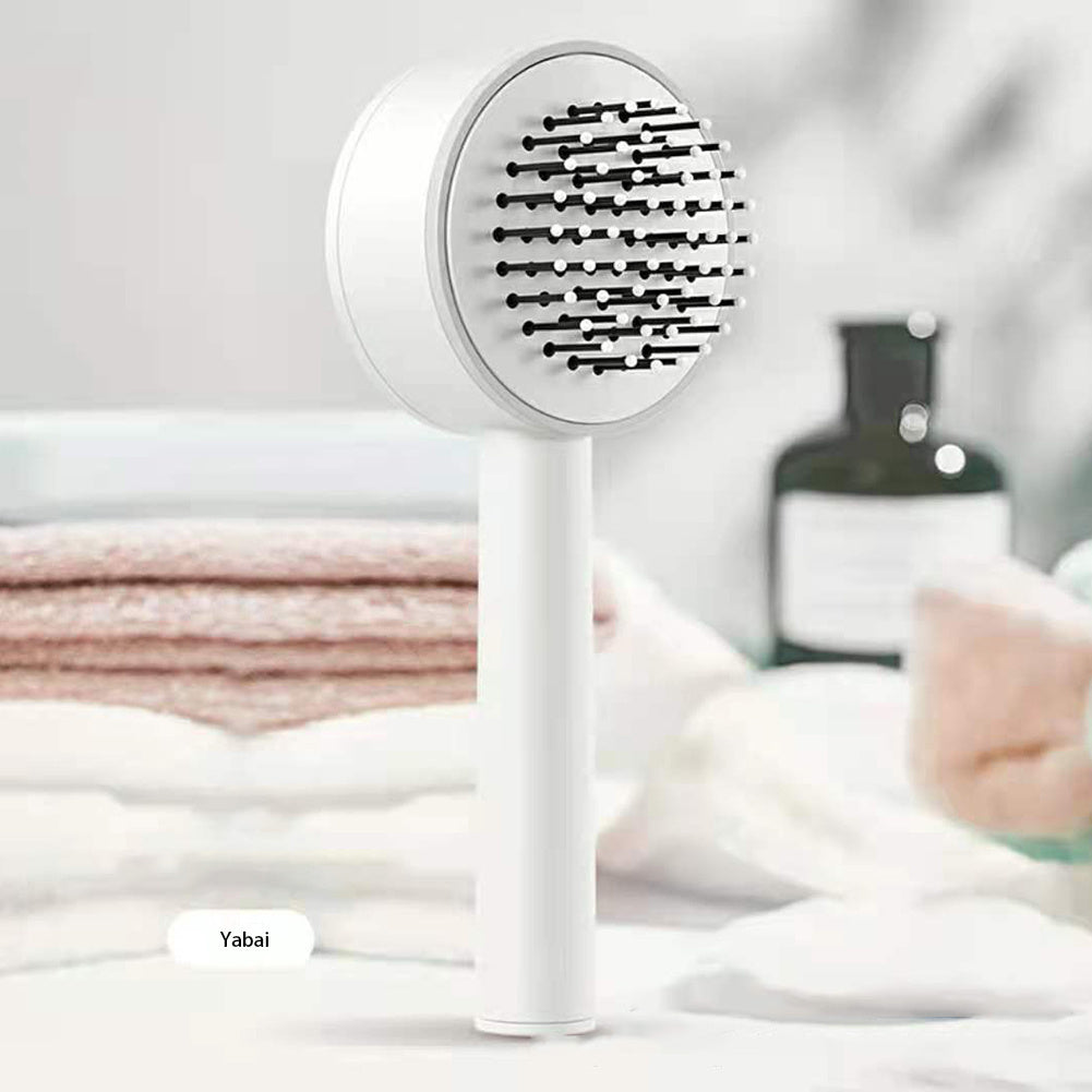 Cepillo autolimpiable de un solo botón LuxuryGlow: peine desenredante con masaje antiestático
