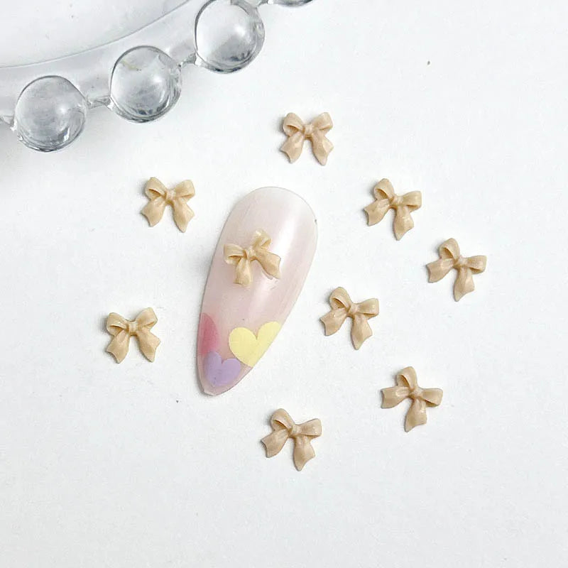 LuxuryGlow 50Pcs 3D Resin Bowknots Nail Art Decorations – Mini Acrylic Ribbon Charms for DIY Nails