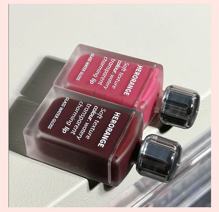 Brillo labial HERORANGE Glass Water | Hidratante, voluminizador y de larga duración
