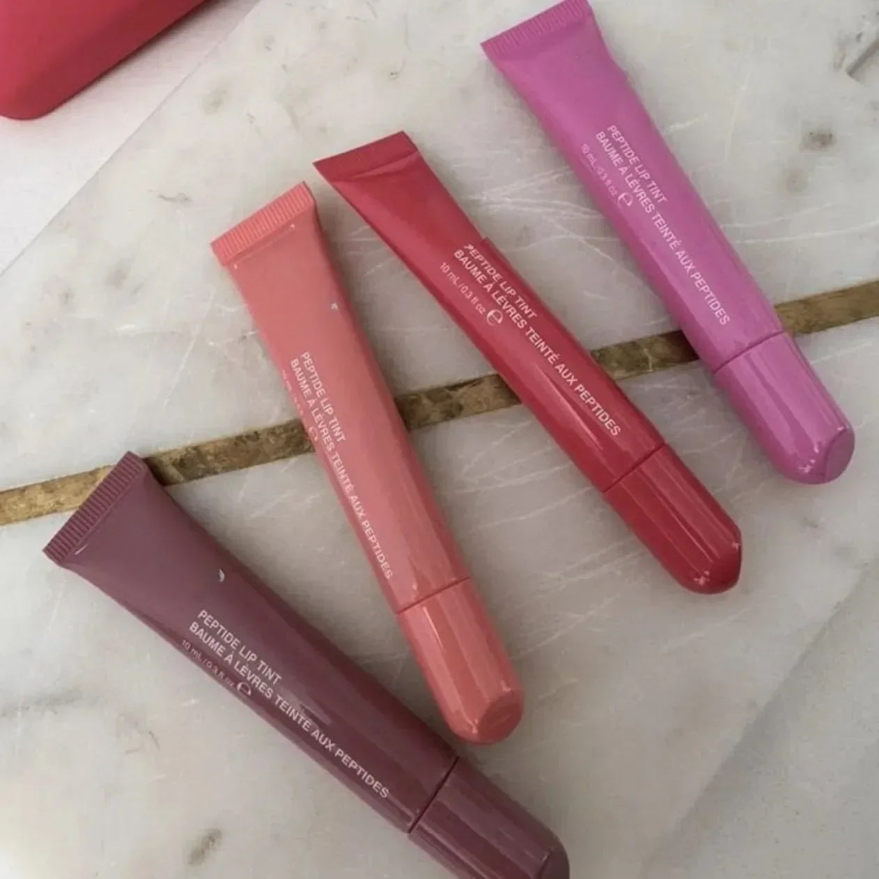 Rubor en barra para labios y mejillas Page Vine: brillo hidratante en tonos crema de moda